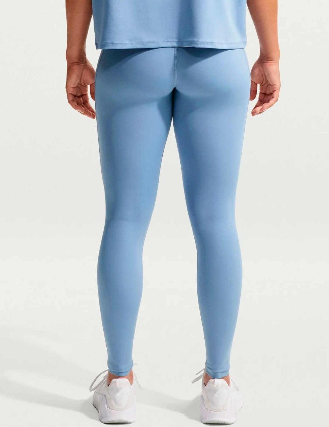 malla larga mujer nike  PRO WOMEN'S MID-RISE, celeste