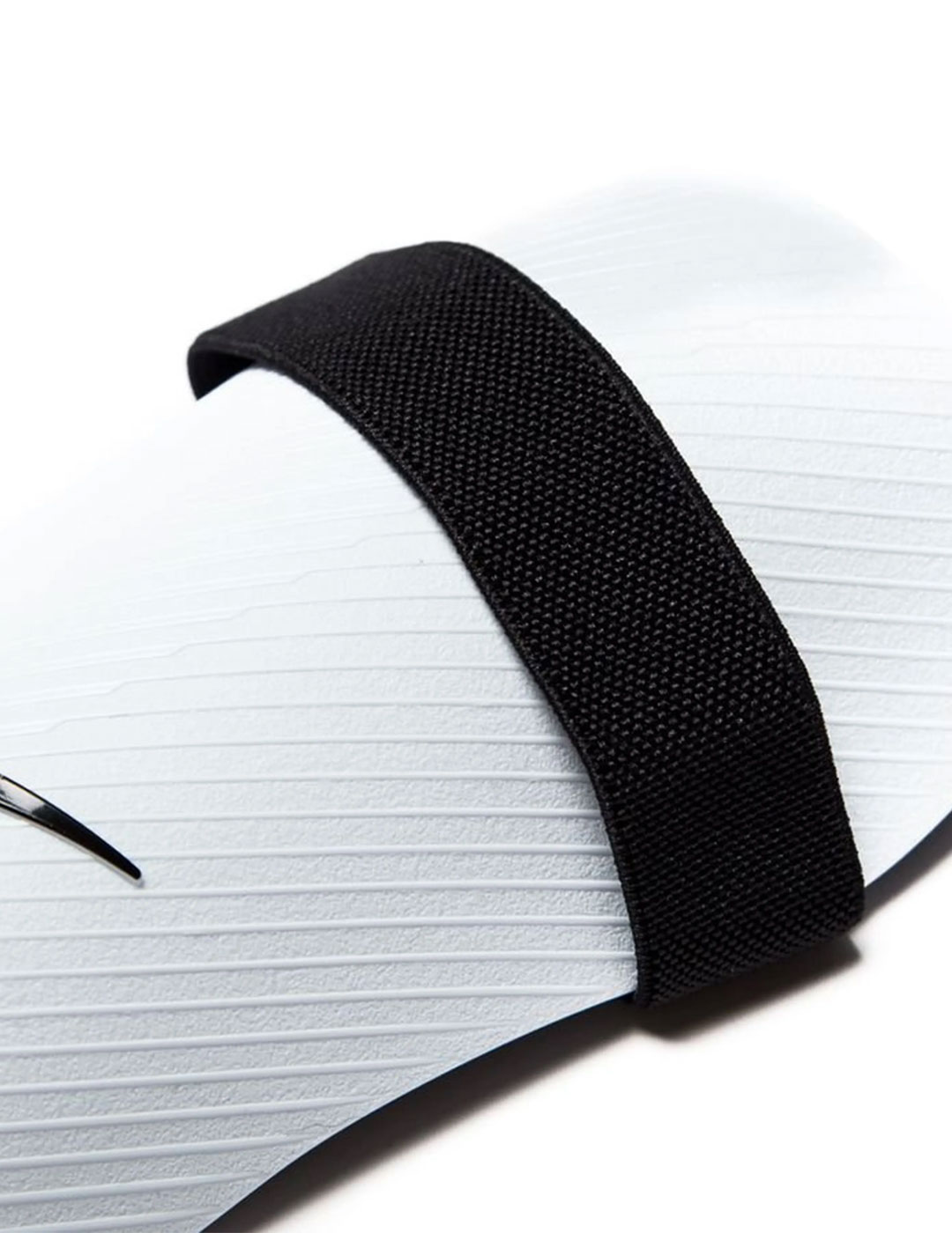 espinillera nike con gomas, blanco/negro